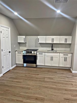 Interior, Kitchen, Recessed Lighting, Stainless Steel Appliances, Wood Texture Flooring