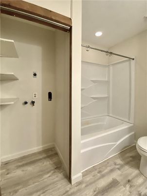 Bathroom, Interior, Recessed Lighting, Walk-in Closets, Wood Texture Flooring