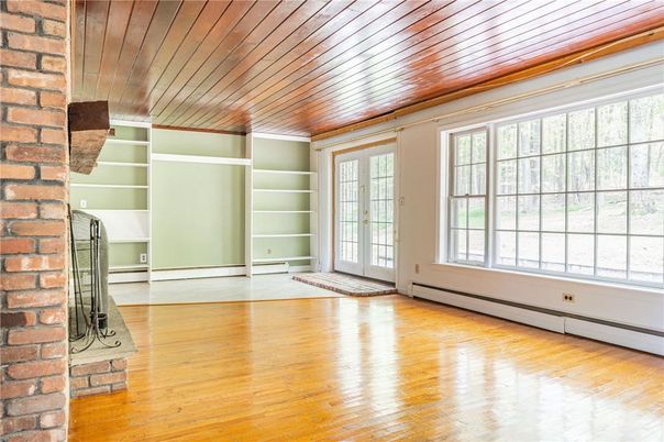 Empty room, Fireplace, Interior, Stone Walls, Wooden Ceilings, Wood Texture Flooring