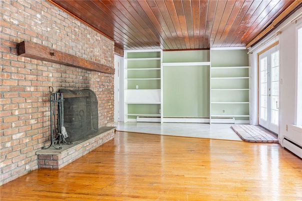 Empty room, Fireplace, Interior, Stone Walls, Wooden Ceilings, Wood Texture Flooring