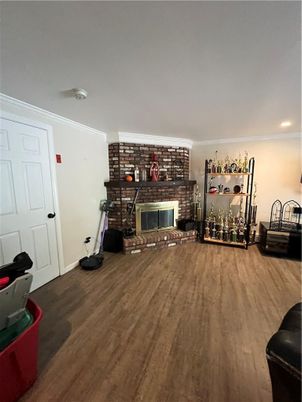 Fireplace, Interior, Recessed Lighting, Stone Walls, Wood Texture Flooring