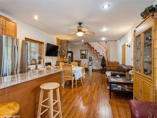 Dining room, Interior, Kitchen, Recessed Lighting, Stainless Steel Appliances, Wood Texture Flooring