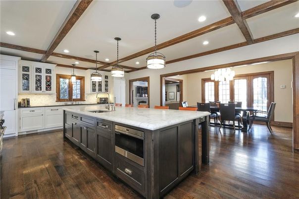 Chandelier, Dining room, Interior, Kitchen, Pendant Lights, Recessed Lighting, Stainless Steel Appliances, Wooden Beams, Wood Texture Flooring