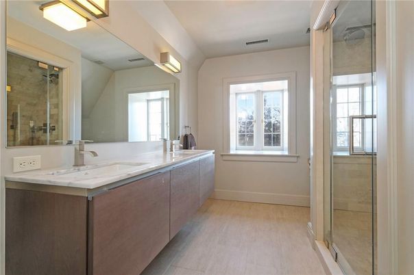 Bathroom, Dual Sink Vanities, Glass Shower, Interior, Wood Texture Flooring