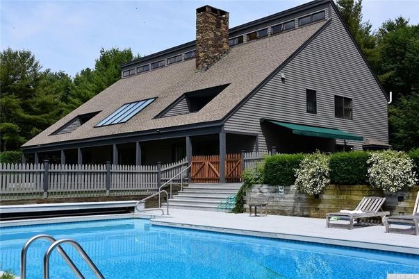 Exterior, Pool, Solar Panels
