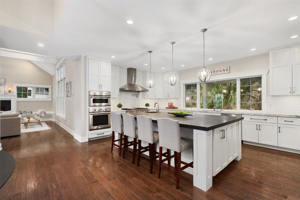 Dining room, Fireplace, Interior, Kitchen, Living room, Pendant Lights, Recessed Lighting, Stainless Steel Appliances, Wood Texture Flooring