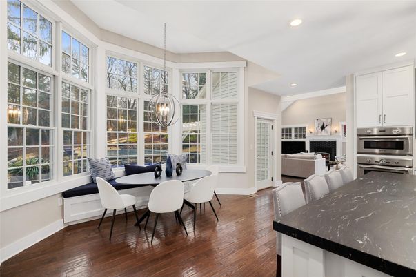 Dining room, Fireplace, Interior, Kitchen, Living room, Pendant Lights, Recessed Lighting, Stainless Steel Appliances, Wood Texture Flooring