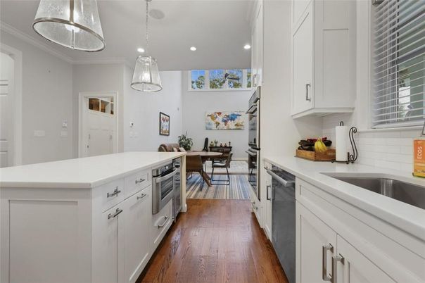 Dining room, Interior, Kitchen, Pendant Lights, Recessed Lighting, Stainless Steel Appliances, Wood Texture Flooring