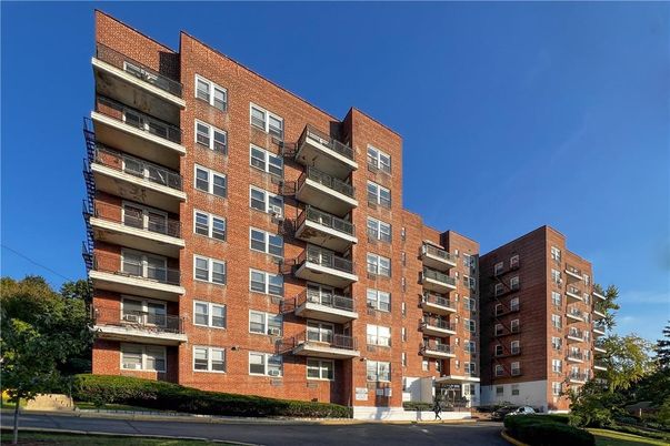 Exterior, Facade, Brick Facade, Condo Building