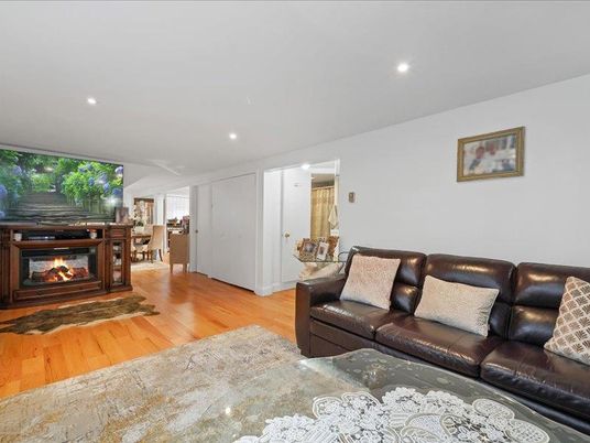 Fireplace, Interior, Living room, Recessed Lighting, Wood Texture Flooring
