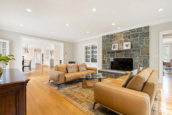 Fireplace, Interior, Living room, Recessed Lighting, Stone Walls, Wood Texture Flooring