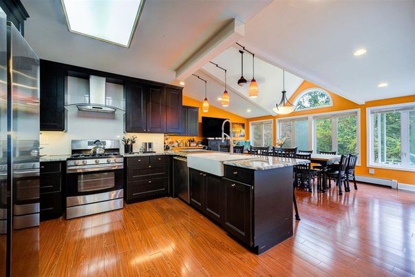 Dining room, Interior, Kitchen, Pendant Lights, Recessed Lighting, Stainless Steel Appliances, Wood Texture Flooring