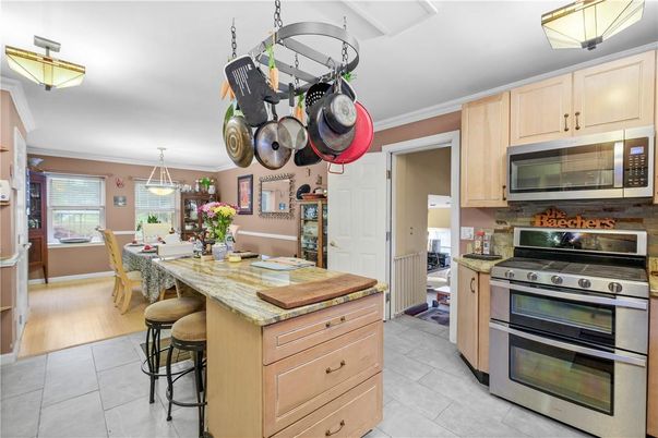 Dining room, Interior, Kitchen, Pendant Lights, Stainless Steel Appliances, Wood Texture Flooring