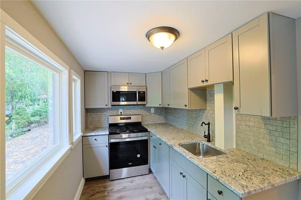 Interior, Kitchen, Stainless Steel Appliances, Wood Texture Flooring