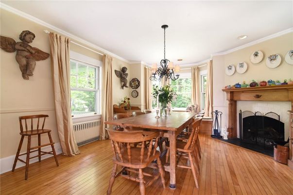 Chandelier, Dining room, Fireplace, Interior, Recessed Lighting, Wood Texture Flooring