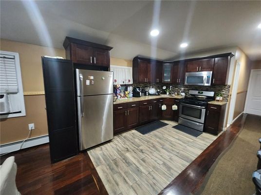 Interior, Kitchen, Recessed Lighting, Stainless Steel Appliances, Wood Texture Flooring