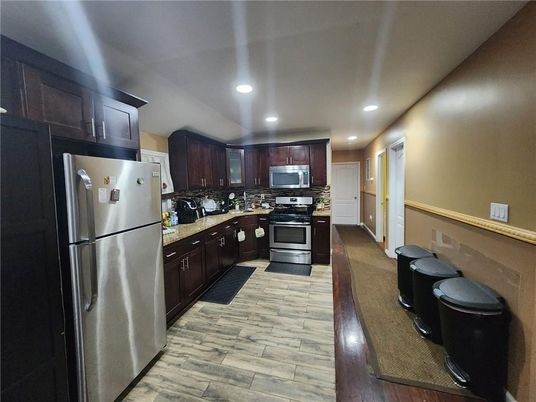 Interior, Kitchen, Recessed Lighting, Stainless Steel Appliances, Wood Texture Flooring