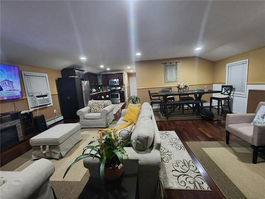 Dining room, Interior, Kitchen, Living room, Recessed Lighting, Stainless Steel Appliances, Wood Texture Flooring