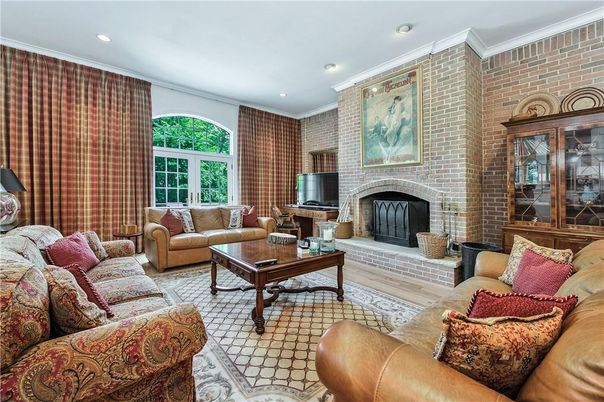Fireplace, Interior, Living room, Recessed Lighting, Stone Walls, Wood Texture Flooring