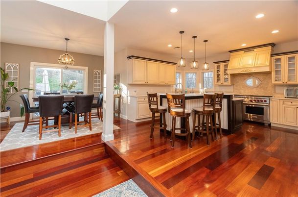 Dining room, Interior, Kitchen, Pendant Lights, Recessed Lighting, Stainless Steel Appliances, Wood Texture Flooring