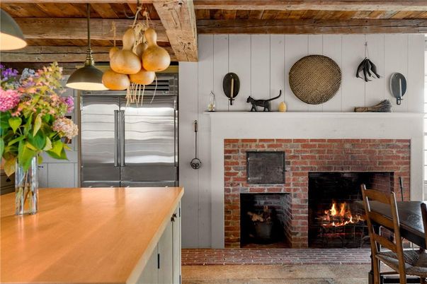 Fireplace, Interior, Kitchen, Pendant Lights, Stainless Steel Appliances, Stone Walls