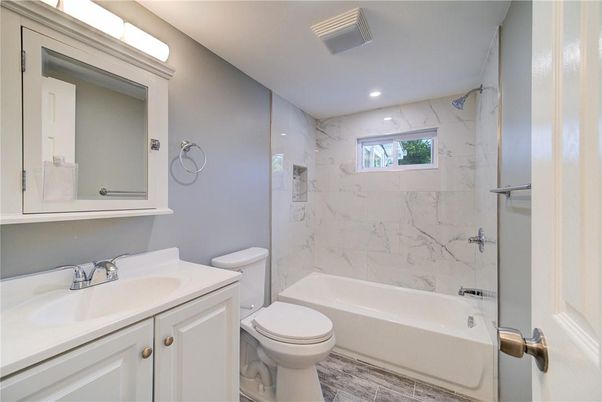 Bathroom, Interior, Marble Walls, Recessed Lighting, Wood Texture Flooring