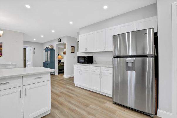 Interior, Kitchen, Recessed Lighting, Stainless Steel Appliances, Wood Texture Flooring