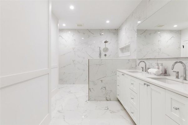 Bathroom, Dual Sink Vanities, Interior, Marble, Marble Walls, Recessed Lighting