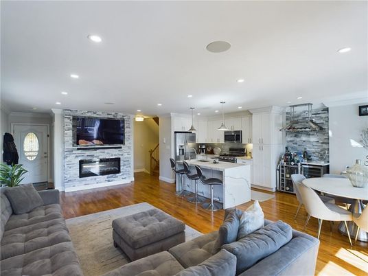 Dining room, Fireplace, Interior, Kitchen, Living room, Pendant Lights, Recessed Lighting, Stainless Steel Appliances, Stone Walls, Wood Texture Flooring