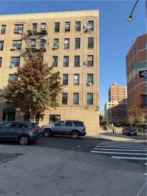 Exterior, Facade, Brick Facade, Condo Building