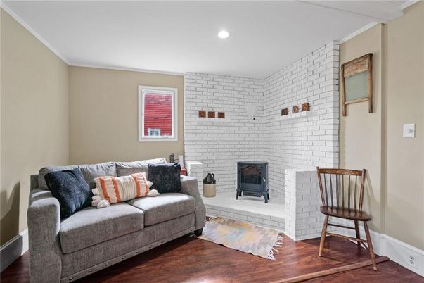 Fireplace, Interior, Recessed Lighting, Stone Walls, Wood Texture Flooring
