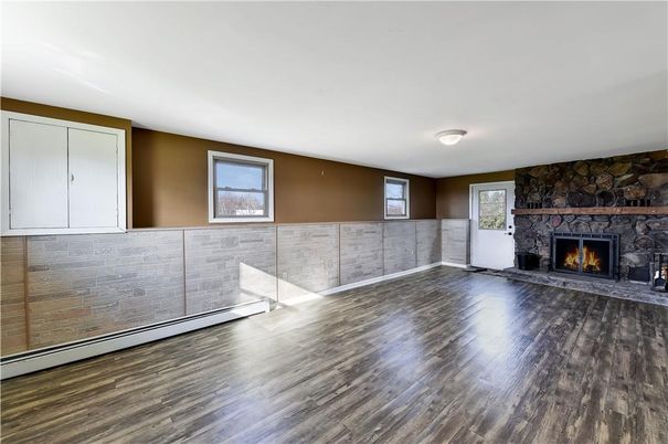 Empty room, Fireplace, Interior, Stone Walls, Wood Texture Flooring