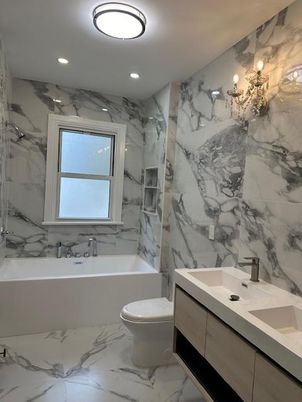 Bathroom, Dual Sink Vanities, Interior, Marble, Marble Walls, Recessed Lighting