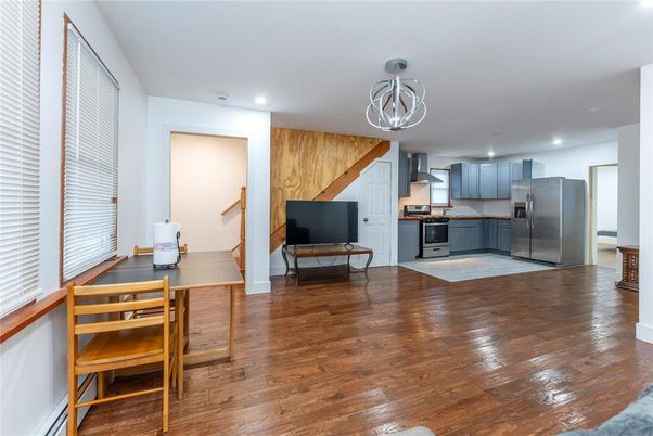 Dining room, Interior, Kitchen, Recessed Lighting, Stainless Steel Appliances, Wood Texture Flooring
