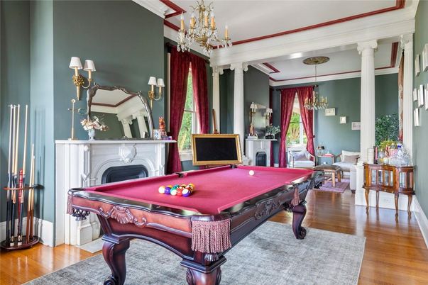 Billiard Table, Chandelier, Fireplace, Game Room, Interior, Pendant Lights, Wood Texture Flooring