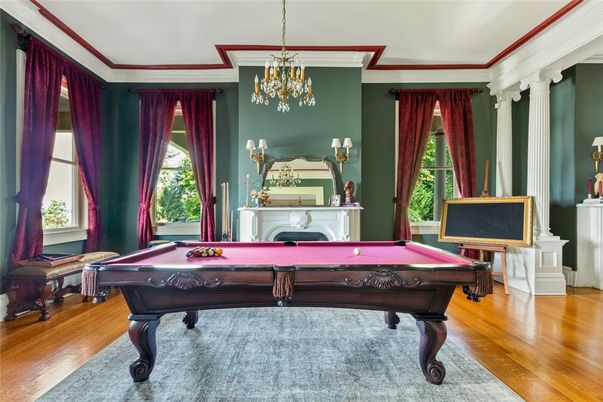 Billiard Table, Chandelier, Fireplace, Game Room, Interior, Pendant Lights, Wood Texture Flooring