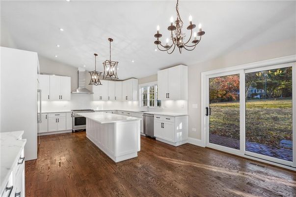 Chandelier, Interior, Kitchen, Pendant Lights, Recessed Lighting, Stainless Steel Appliances, Wood Texture Flooring