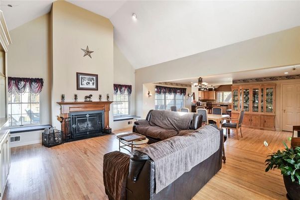 Chandelier, Dining room, Fireplace, Interior, Living room, Recessed Lighting, Wood Texture Flooring