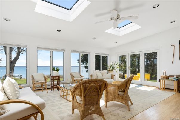 Interior, Living room, Recessed Lighting, Sun Room, Water, Wood Texture Flooring