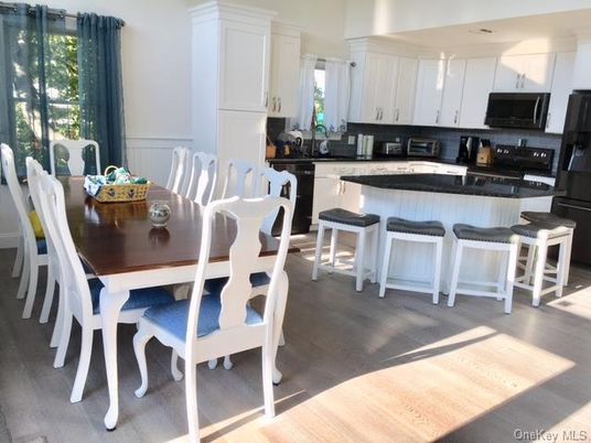 Dining room, Interior, Kitchen, Recessed Lighting, Stainless Steel Appliances, Wood Texture Flooring