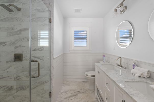 Bathroom, Dual Sink Vanities, Glass Shower, Interior, Marble, Marble Walls