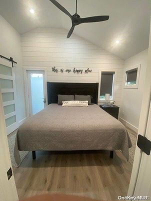 Bedroom, Fireplace, Interior, Recessed Lighting, Wood Texture Flooring