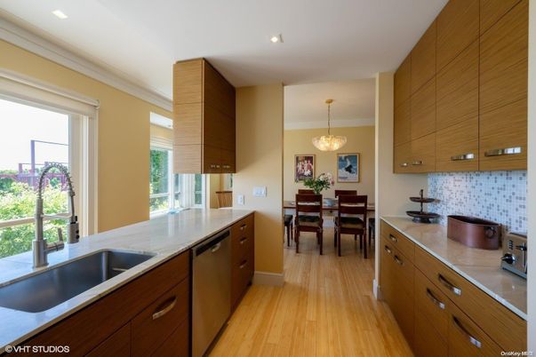 Chandelier, Dining room, Interior, Kitchen, Recessed Lighting, Stainless Steel Appliances, Wood Texture Flooring