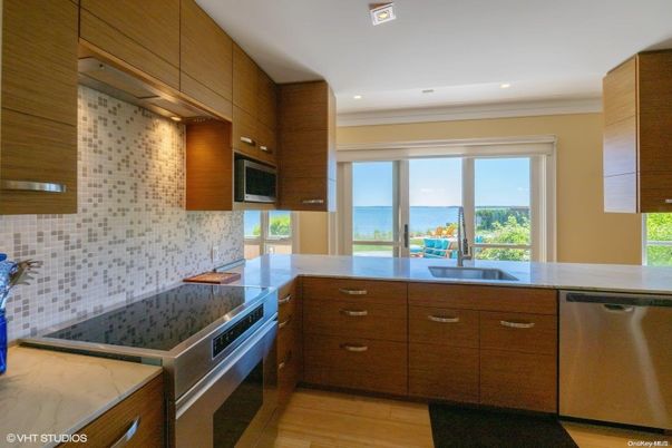Interior, Kitchen, Recessed Lighting, Stainless Steel Appliances, Water, Wood Texture Flooring