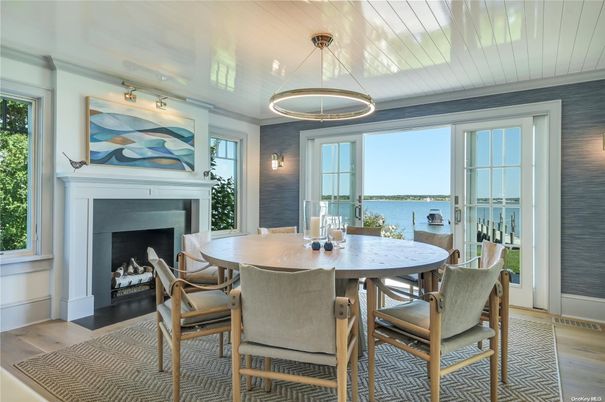 Dining room, Fireplace, Interior, Pendant Lights, Water, Wood Texture Flooring