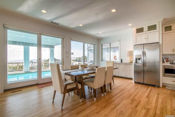 Dining room, Interior, Kitchen, Recessed Lighting, Stainless Steel Appliances, Wood Texture Flooring