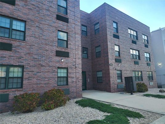 Exterior, Facade, Brick Facade, Condo Building