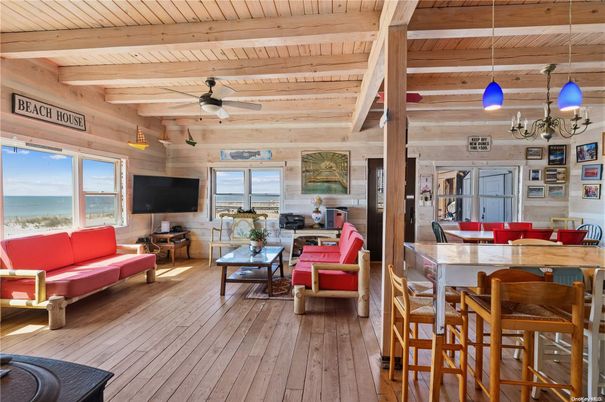 Dining room, Fireplace, Interior, Living room, Pendant Lights, Water, Wooden Beams, Wooden Ceilings, Wood Texture Flooring, Wooden Walls