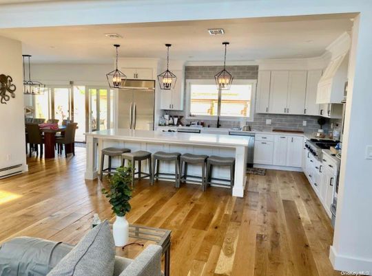 Dining room, Interior, Kitchen, Pendant Lights, Stainless Steel Appliances, Wood Texture Flooring