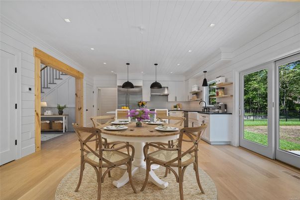 Dining room, Interior, Kitchen, Pendant Lights, Recessed Lighting, Stainless Steel Appliances, Wood Texture Flooring